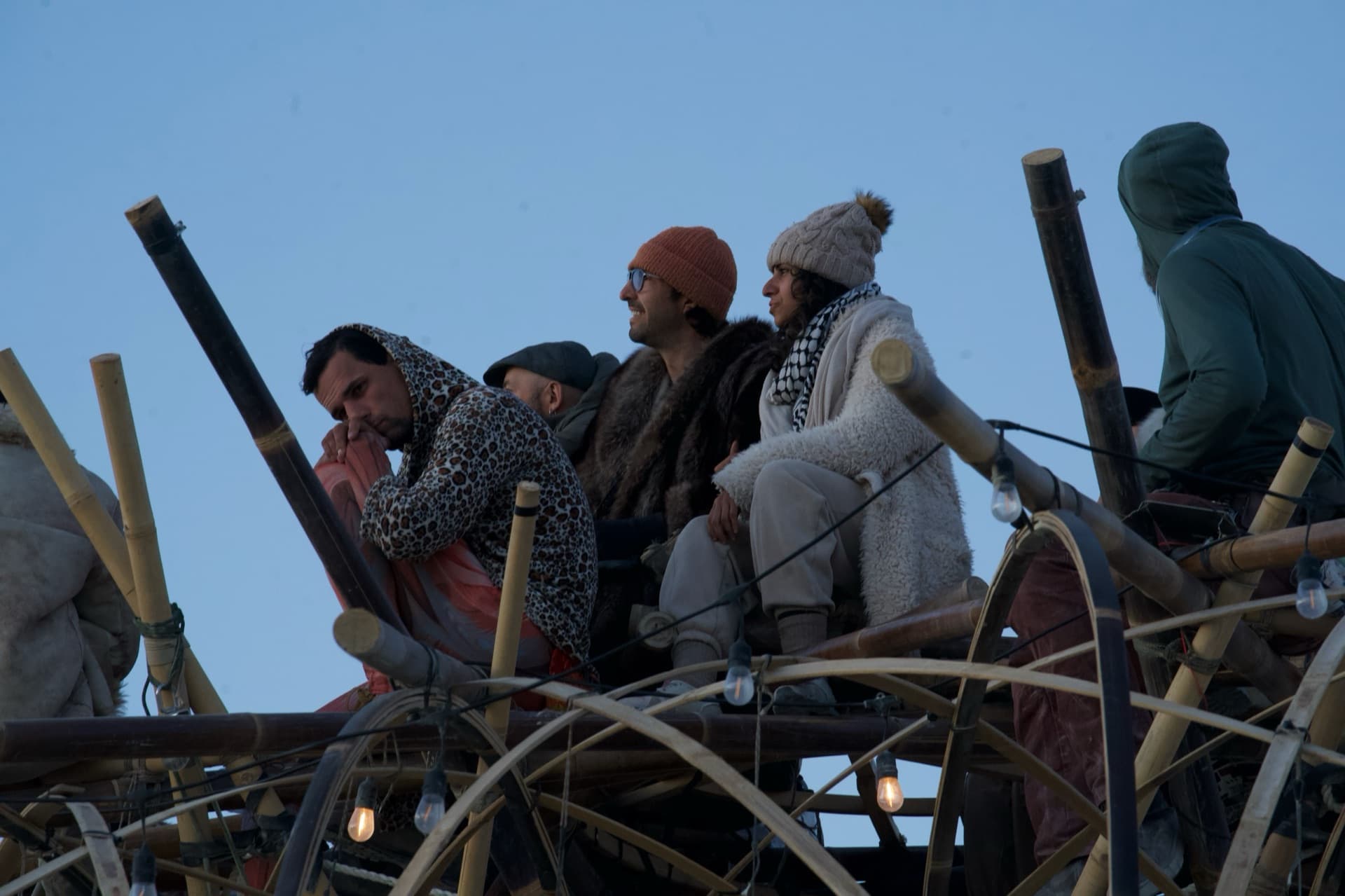 Visitors bundled up on the crown of the Resonance Tree for last light